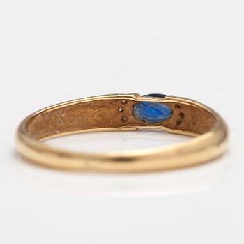 SORMUS, 14K kultaa, safiiri, timantteja n. 0.015 ct yht. Kultakeskus, Hämeenlinna 1999.