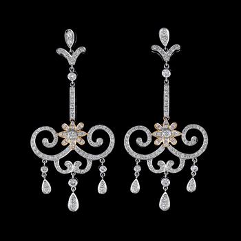 87. A pair of diamond, circa 1.75 cts in total, earrings.