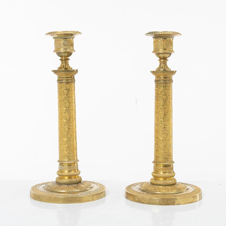 A pair of Empire candlesticks, France, early 19th Century.