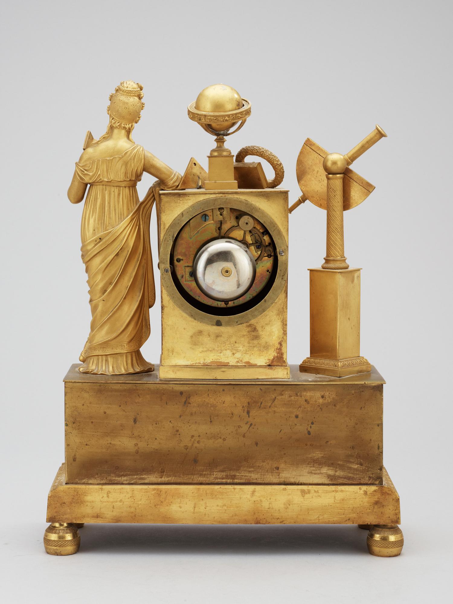 A French Empire early 19th century gilt bronze mantel clock.