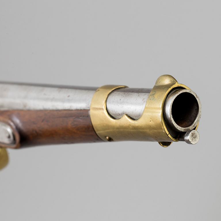 A first half of the 19th century percussion lock pistol.