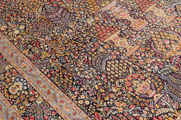 A carpet, Kerman, ca 420 x 298 cm.