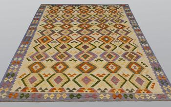 A carpet, kilim, ca 293 x 198 cm.