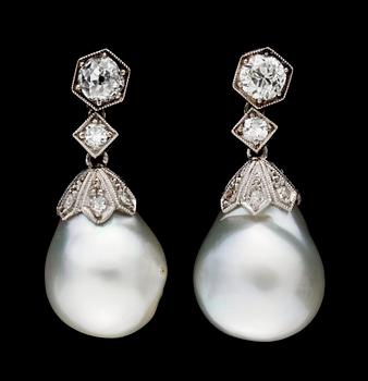 613. A pair of pearl and diamond earrings.