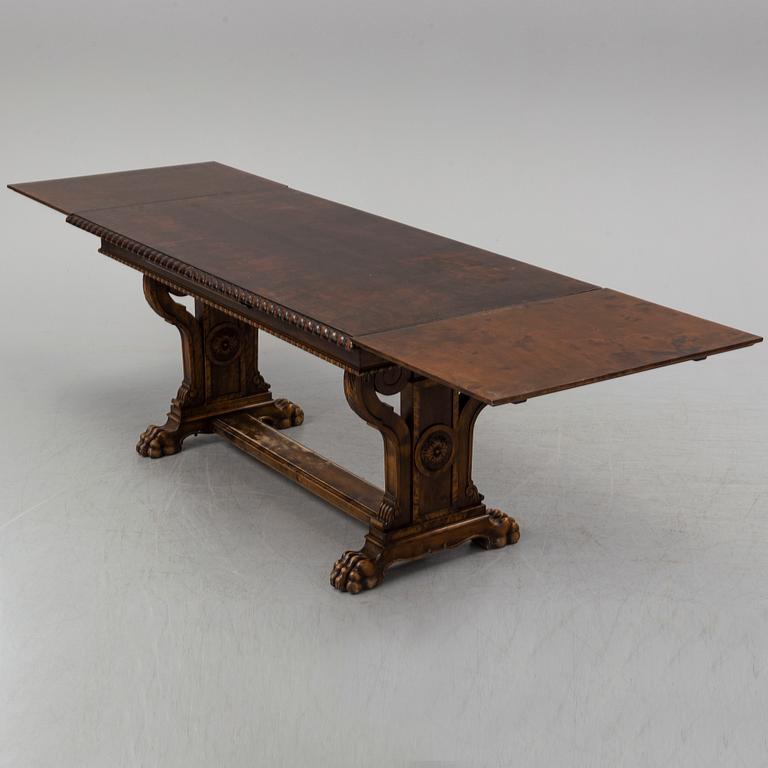 A mid 20th century baroque style dining table.