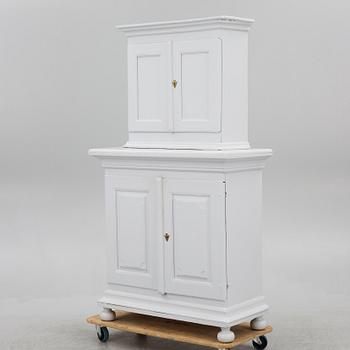 A two-part cabinet, 18th/19th century.