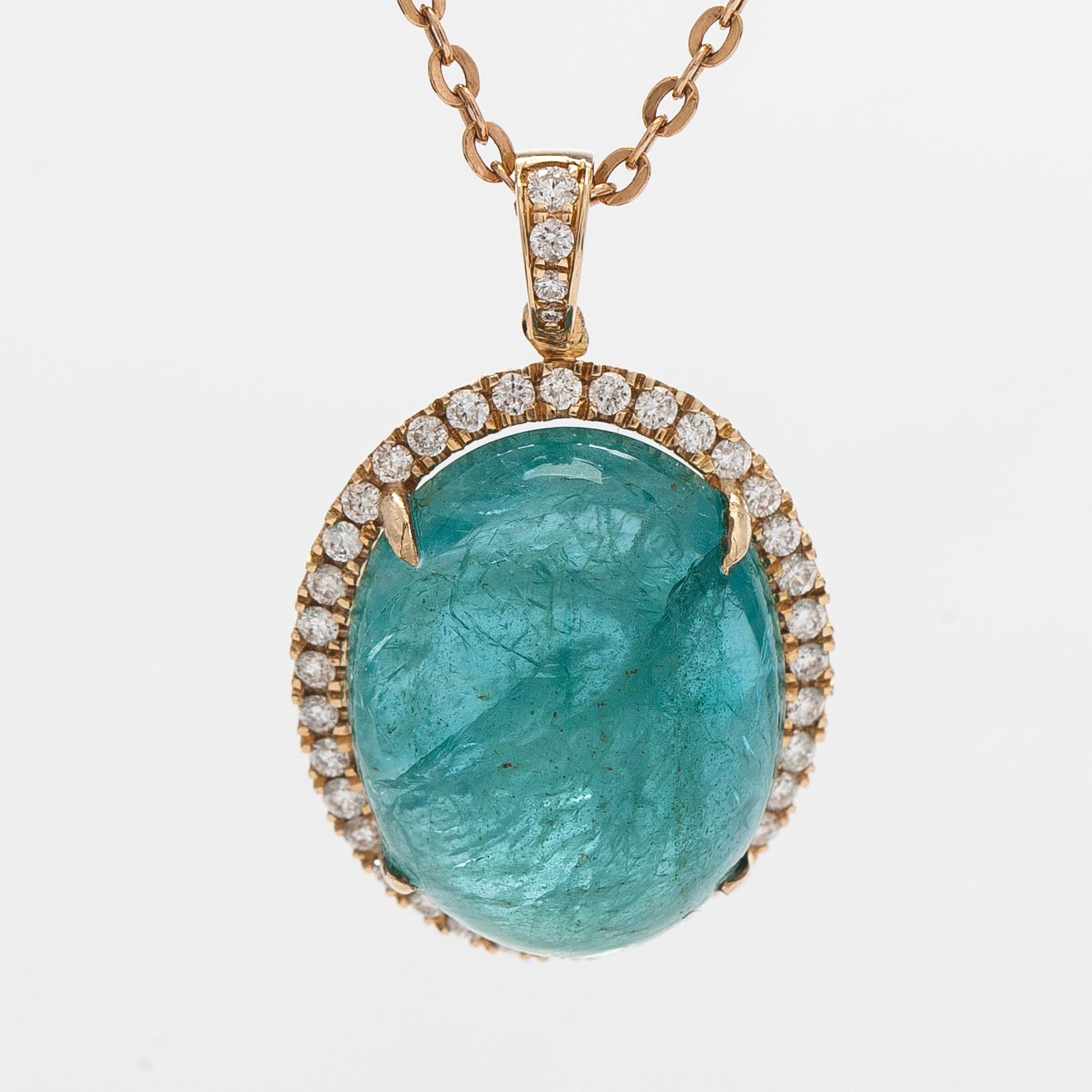 A 14K gold necklace with emerald and diamonds. With IGI certificate.