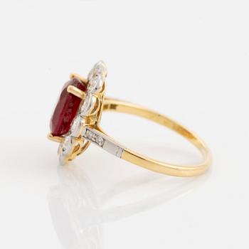 An 18K gold and platinum ring set with a faceted ruby weight ca 3.35 cts.