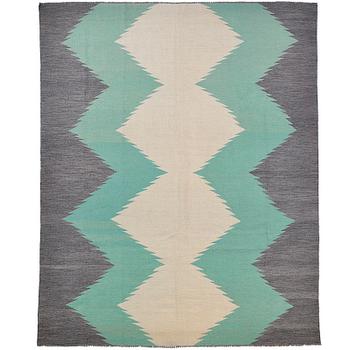 A kilim carpet, ca 303 x 250 cm.