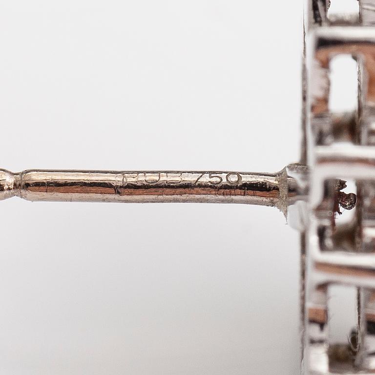 A pair of 18K white gold earrings with brilliant cut diamonds ca. 0.96 ct in total and rubies. Rubens, Helsinki.