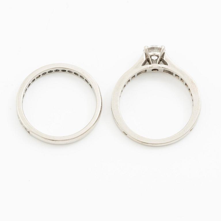 Cartier two rings platinum with round brilliant-cut diamonds.