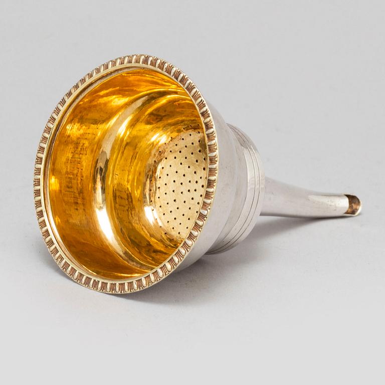 GUSTAF FOLCKER, a parcel-gilt silver strainer, Stockholm 1831.