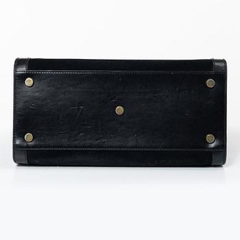 Yves Saint Laurent, a 'Sac du Jour' handbag.