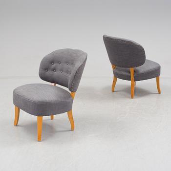 A pair of "Gamla Berlin" easy chairs by Carl Malmsten.