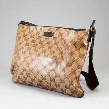 GUCCI, a messenger bag.