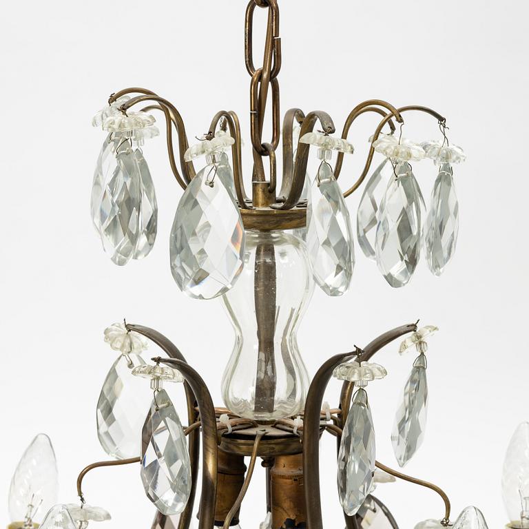 Takkrona, rokokostil, 1900-talets första hälft.