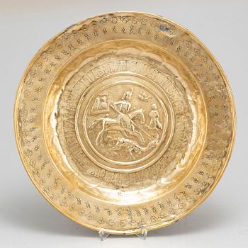 A german brass christening plate,  probably Nuremberg, 16th century.