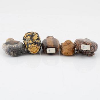 Ten snuff bottles, mottled stone, China, 20th century.