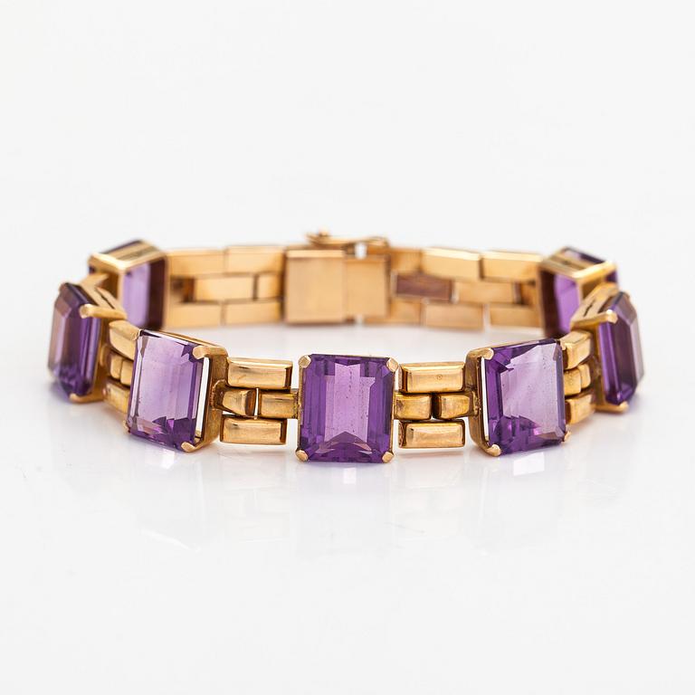 Rannekoru, 18K kultaa ja ametisteja.