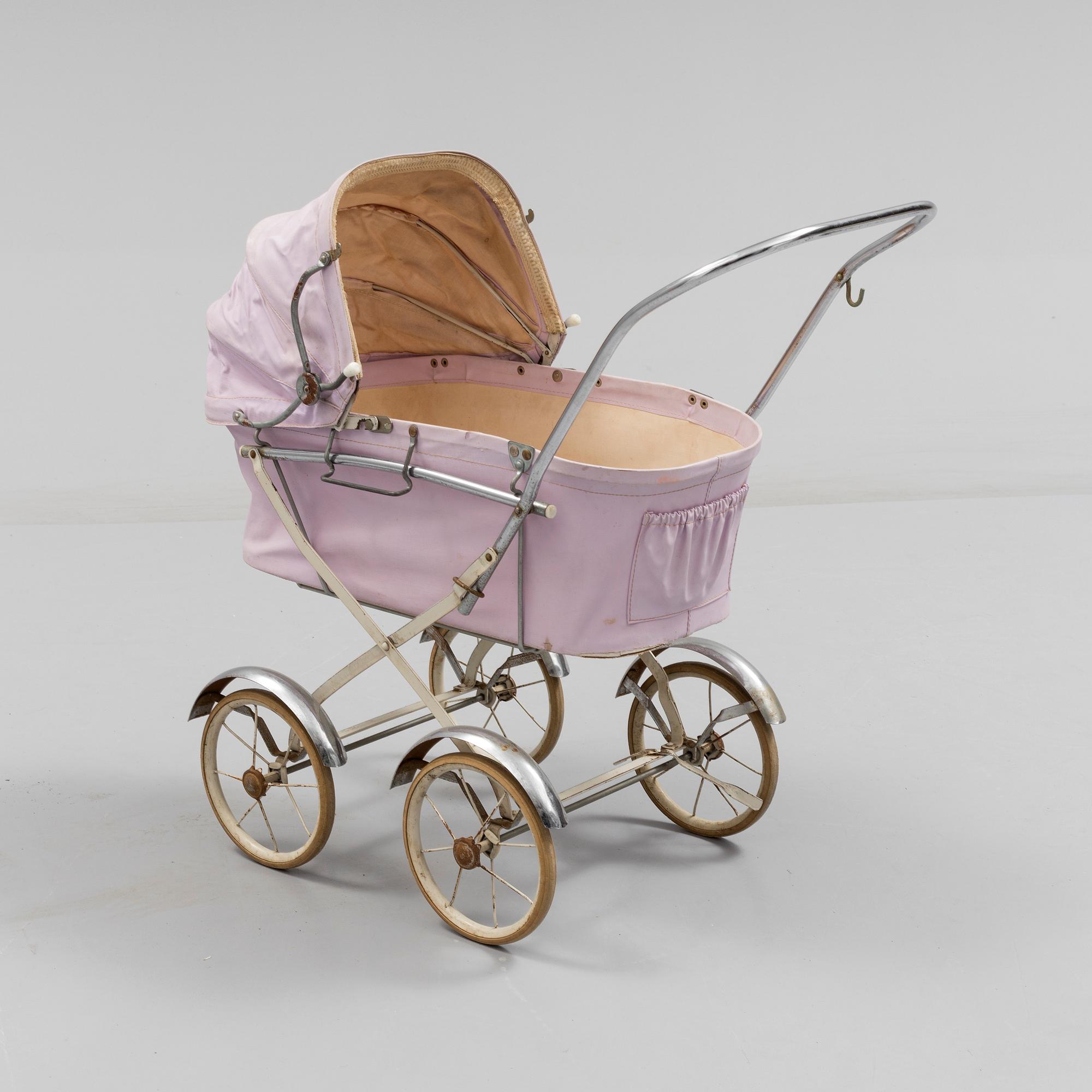 A TOY BABY CARRIAGE 1960s. Bukowskis