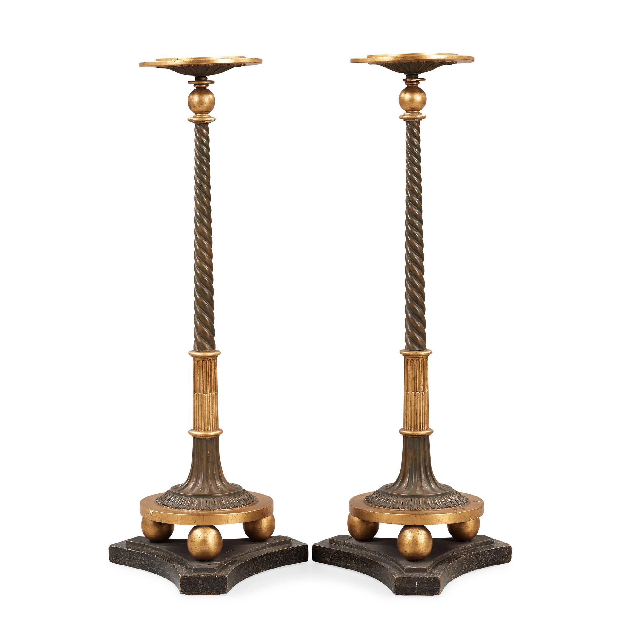 A pair of late Gustavian early 19th century candle stands.