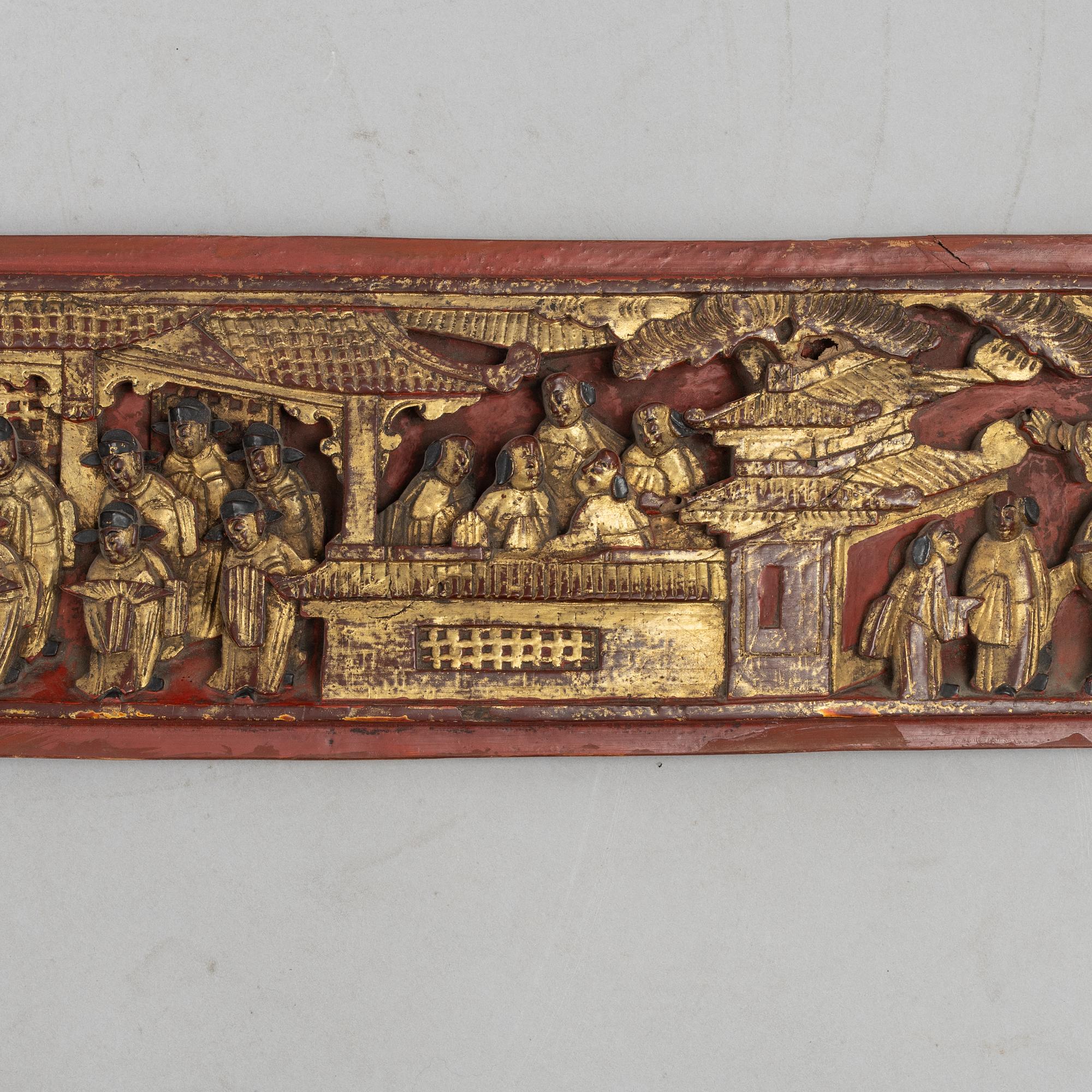 A group of three Chinese wooden panels, late Qing dynasty / around 1900.