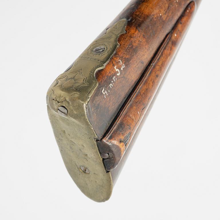 A converted percussion gun, 18th Century.