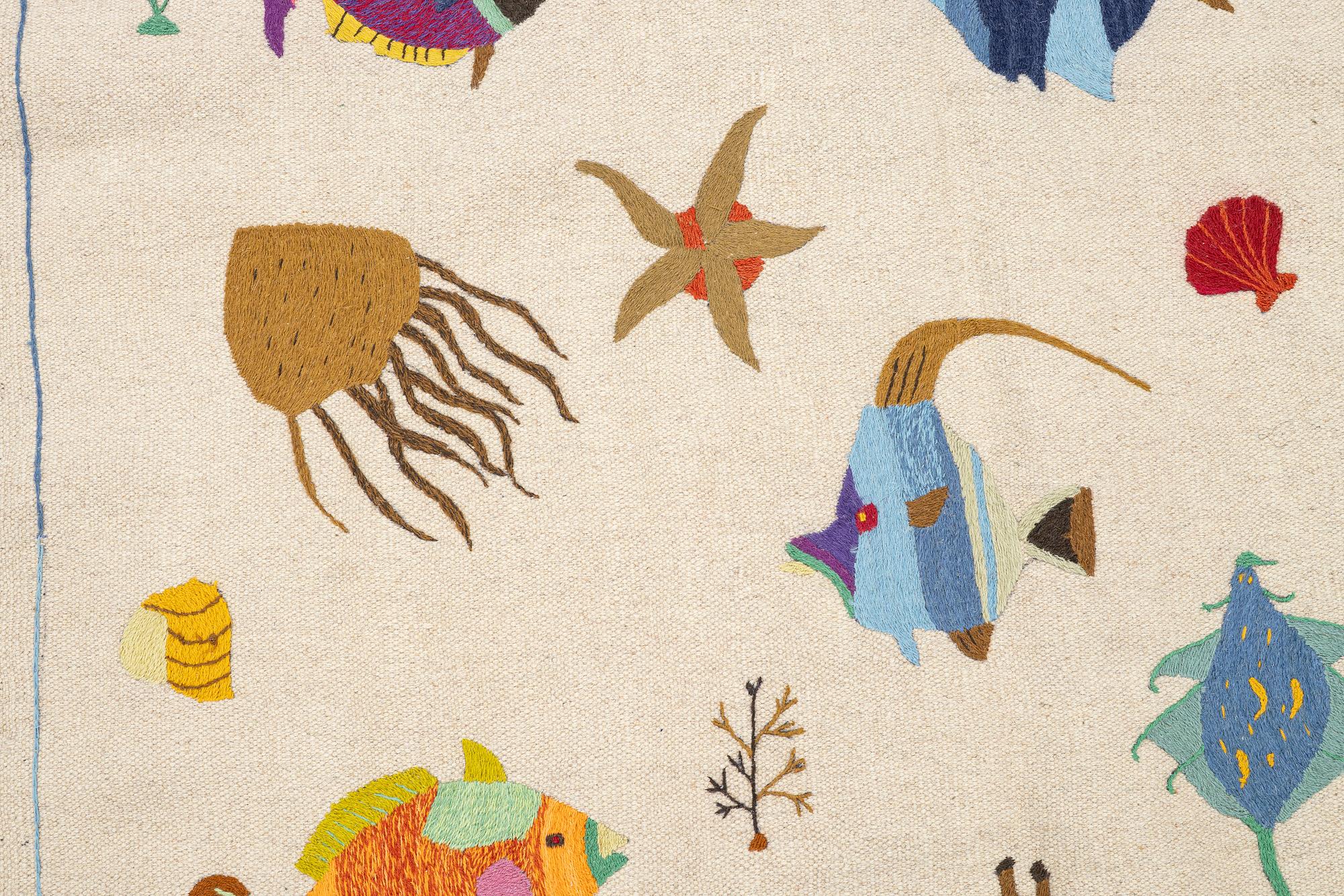 A hand-embroidered Kelim rug, c. 195 x 143 cm.