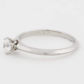 A brilliant cut diamond ring by Tiffany & Co.