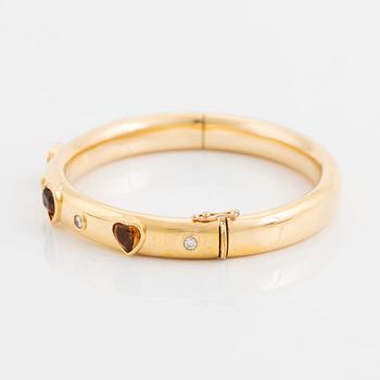 Armring 18K guld med hjärtformade citriner och runda briljantslipade diamanter, David Morris.