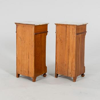 A pair of Neo Renaissance  bedside tables.