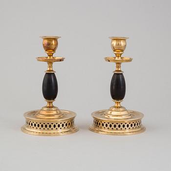 a pair of Skultuna candlesticks from the first half of the 20th century.