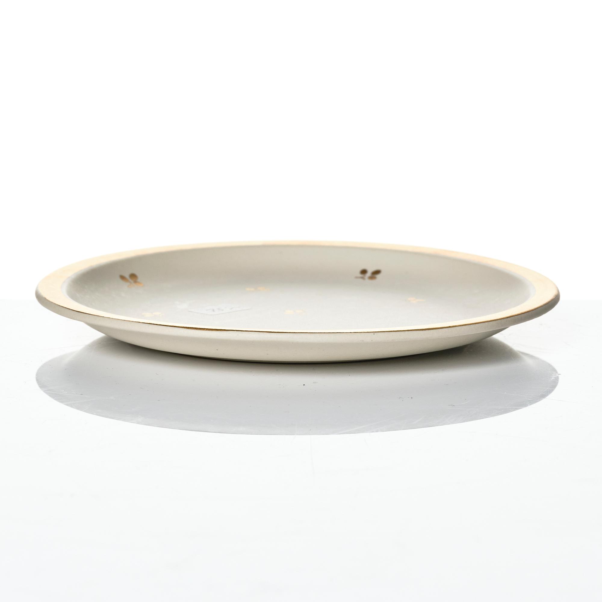 Wilhelm Kåge, 15 pieces of "Carrara" and "Gold Carrara" stoneware dishes, Gustavsberg, Sweden, 1930s/40s.