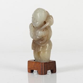 A Chinese stone figure, 20th century.