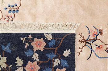 A semi-antique carpet, China, c. 310 x 240 cm.
