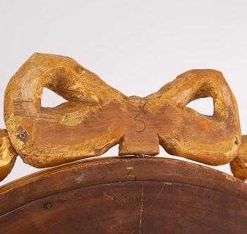 A gustavian style mirror by Erland Tidblad and gilded by Åke Sandelius i the second half of the 20th century.