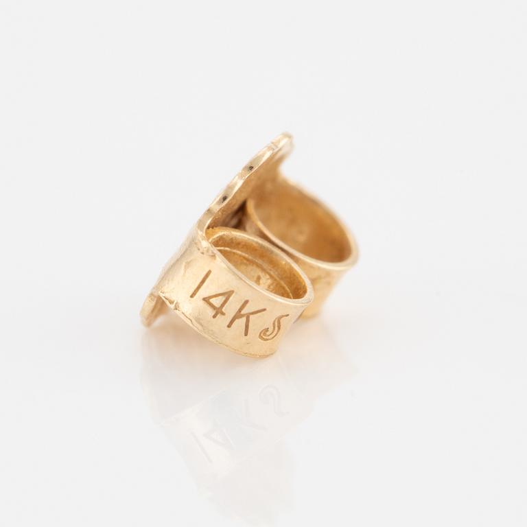 A pair of earrings in 14K gold set with round brilliant-cut diamonds.