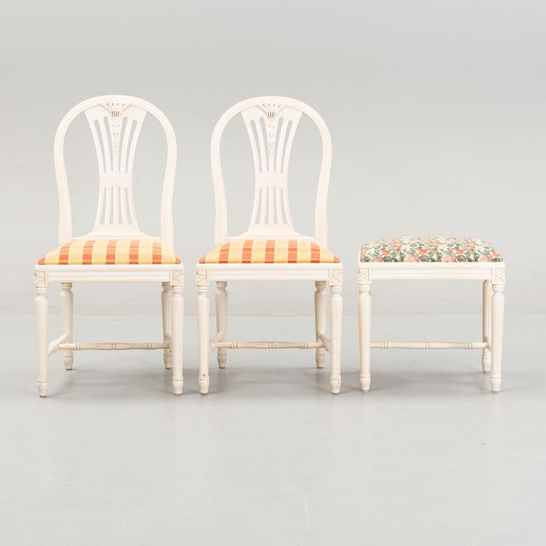 A dining table with eight chairs and a stool, Gustavian style, second half of the 20th Century.