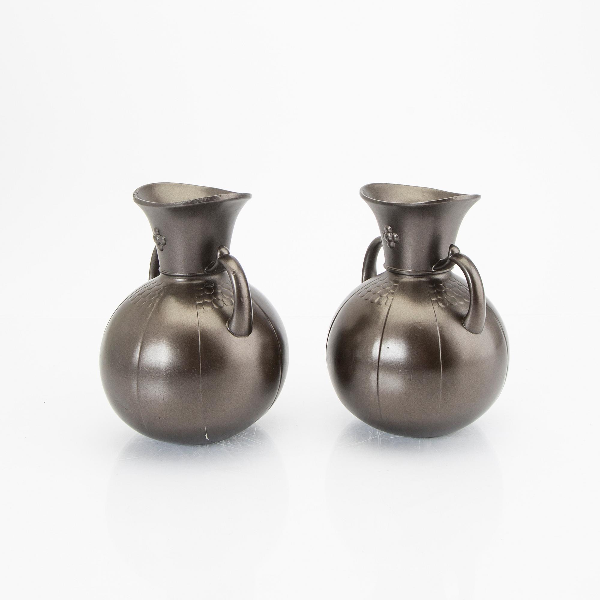 A pair of Just Andersen bronze vases.