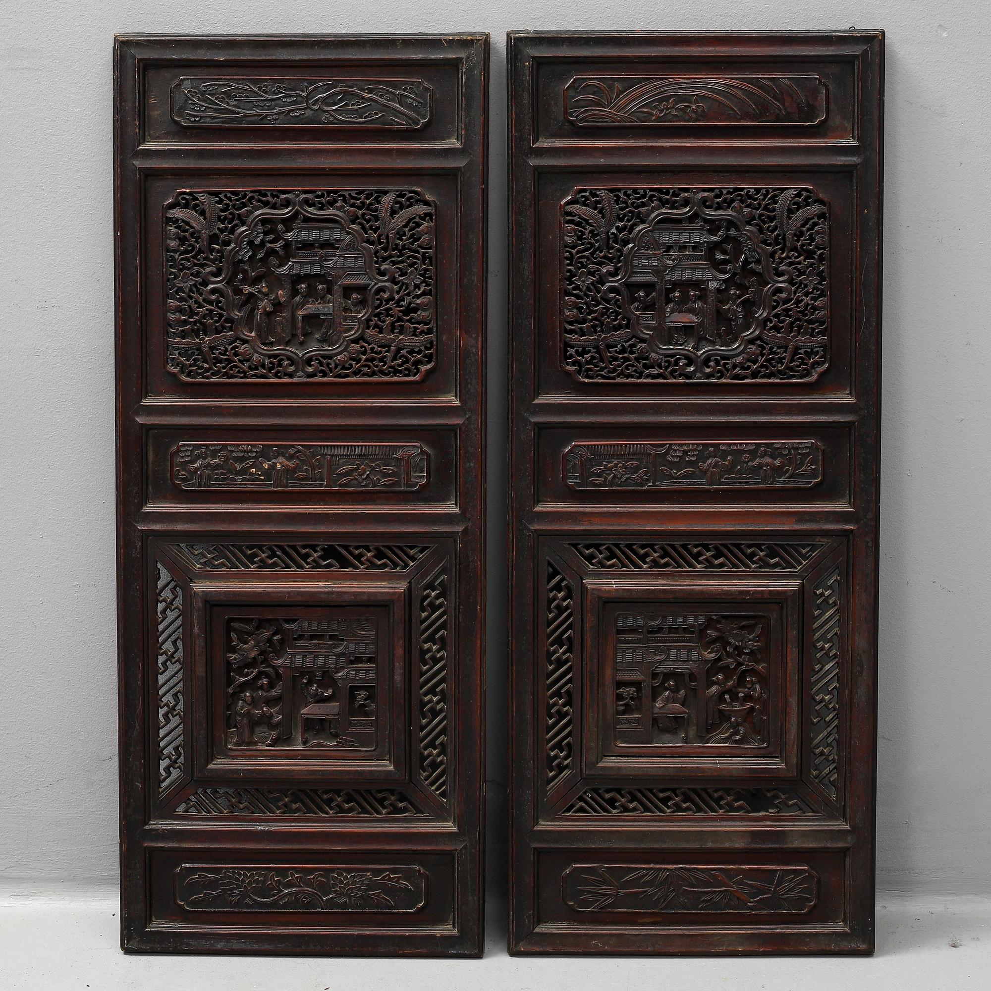Two Chinese wooden carved panels, 20th century.
