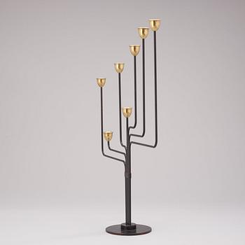 A Piet Hein brass and black lacquered metal candelabrum, 1950's-60's.