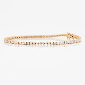 Tennisarmband 18K guld med briljantslipade diamanter.