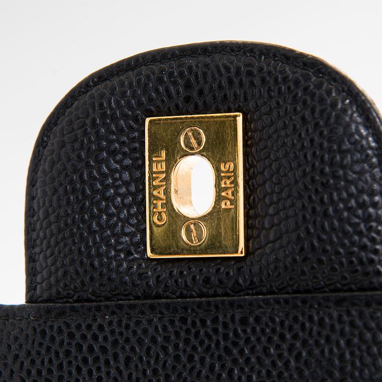 Chanel, a 'Double Flap Bag Maxi' bag, 2010-2011.