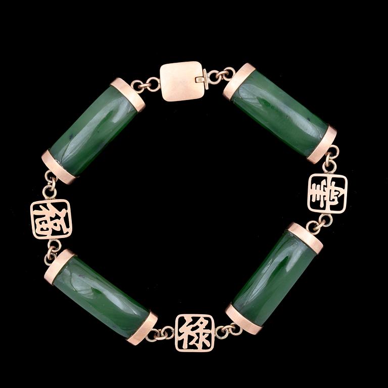 ARMBAND, 18k guld och grön jade, Asien, 1900-andra hälft.