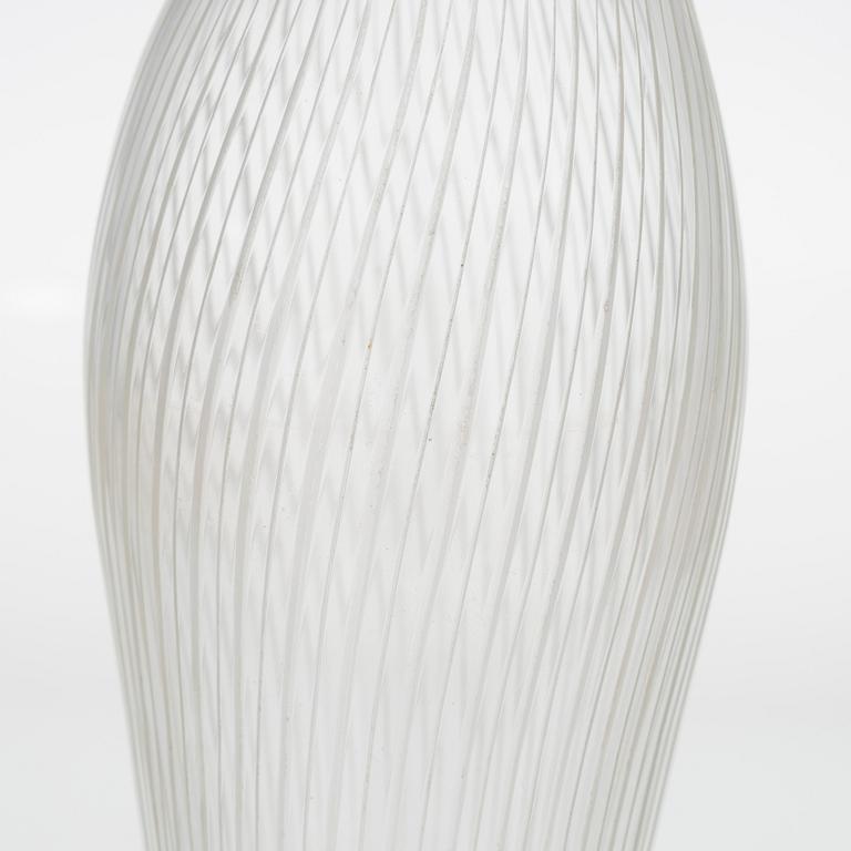 Tapio Wirkkala, four line-cut clear glass vases, signed Tapio Wirkkala Iittala.