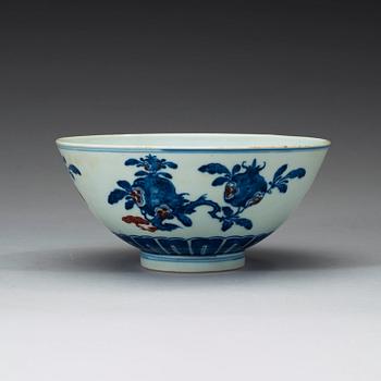 A blue, white and red bowl, late Qing dynasty with Qianlong seal mark.