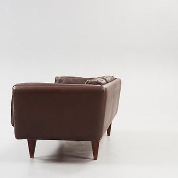 An Illum Wikkelsø three seated brown leather sofa, Michael Laursen, Denmark 1960's.