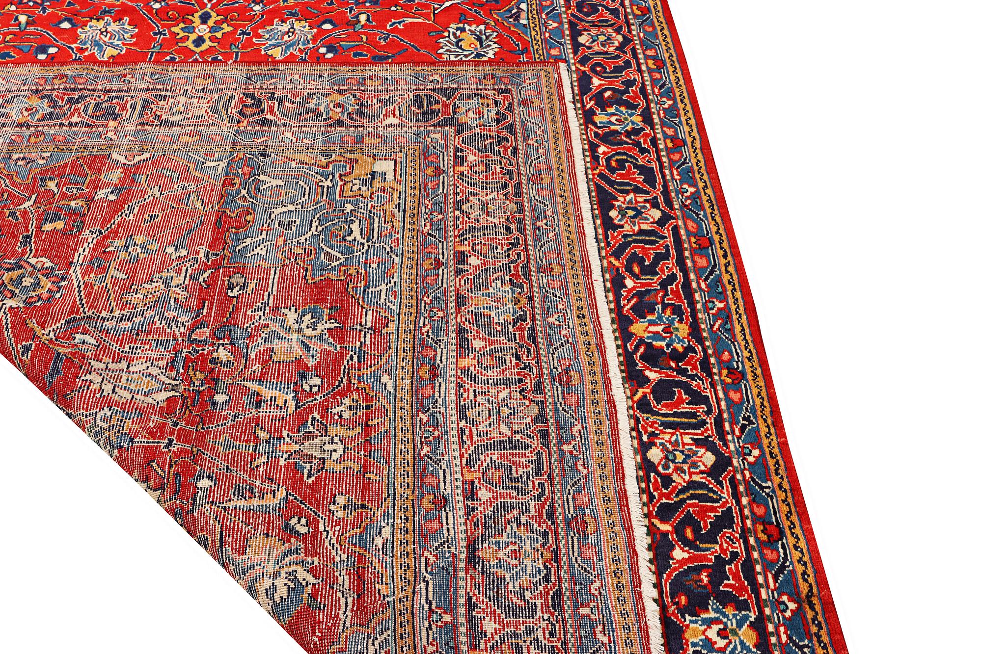 A Hamadan carpet, a. 320 x 220 cm.