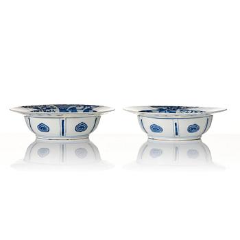 A pair of blue and white Kangxi style dishes, 19th Century.