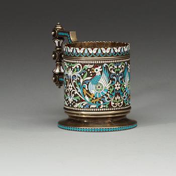 A Russian silver-gilt and enamel tea-glass holder, makers mark of Chlebnikov, Moscow 1892. Imperial Warrant.